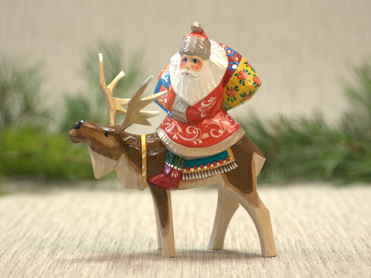 Дед Мороз путешественник на олене