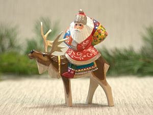 Дед Мороз путешественник на олене